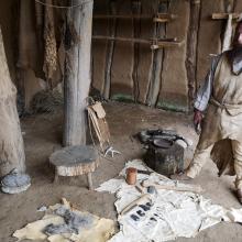 Stone Age farmer with equipment